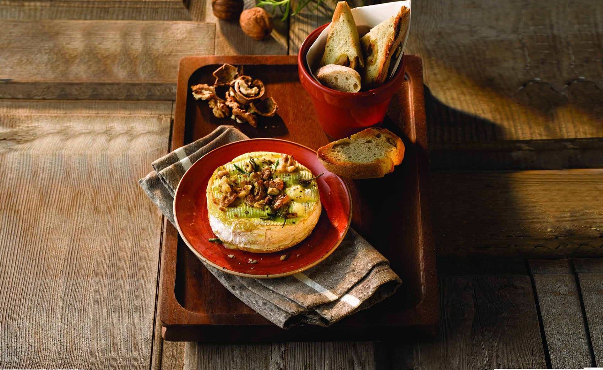 STONECAST SPICED ORANGE CAMEMBERT ON WOODEN BOARD WITH BOT EXTENDED